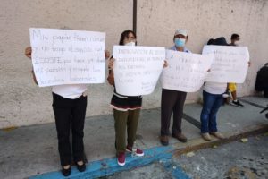 Trabajadores despedidos en protesta